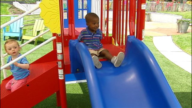 media/kids-on-slide.jpg